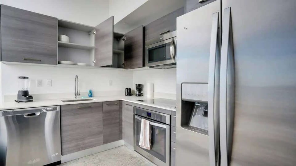 Fully equipped kitchen with complete set of cookware