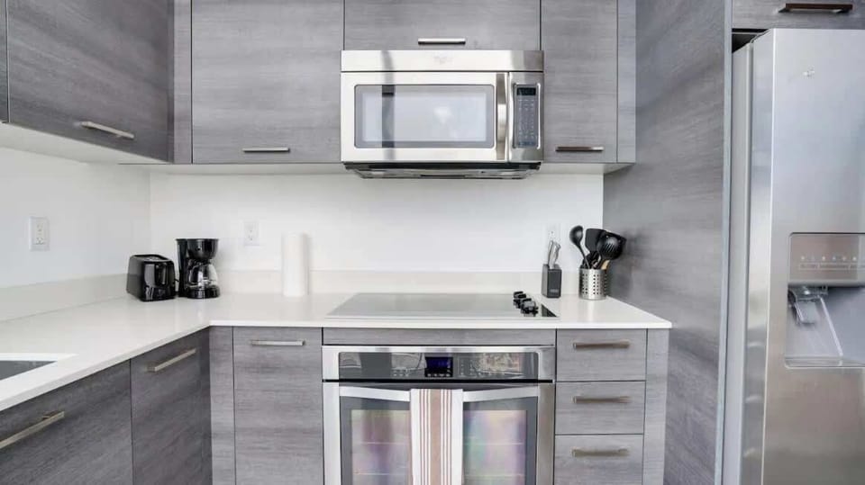 Fully equipped kitchen with complete set of cookware