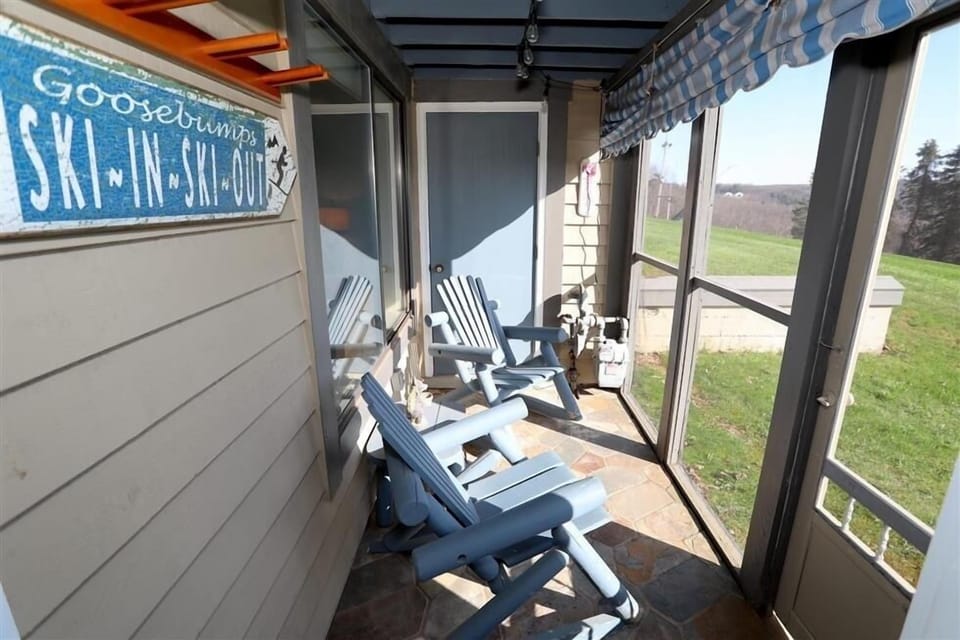 Chair, Furniture, Balcony, Building, Architecture