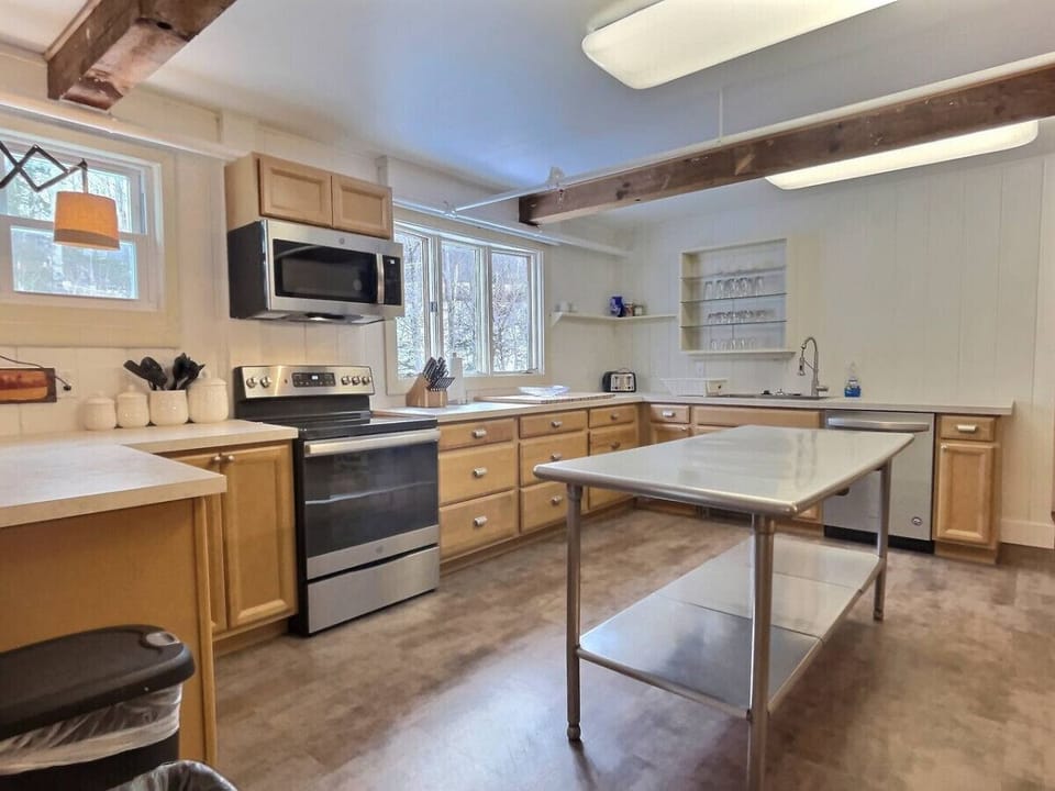 Whip up a memorable meal in the large kitchen with commercial fridge