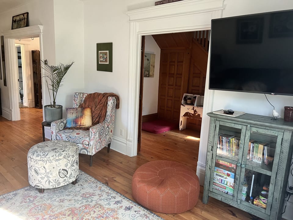 Doors close at this entrance separating hosts area leading to upstairs apartment