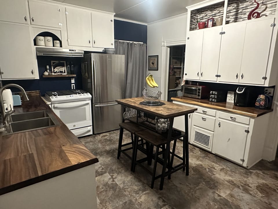 Newly remodeled kitchen! Bonus dining seating at kitchen island.
