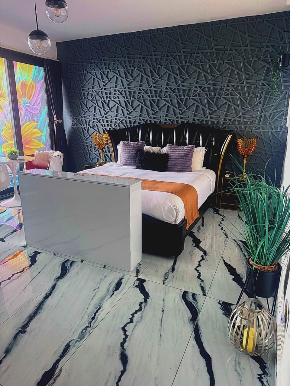 The Suite includes a dreamy KING Size bed, AC, pop up smart TV at the tips of your bed, direct access to your private pool and much more!