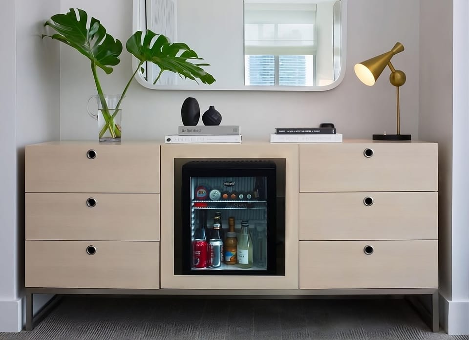 Grab chilled drinks anytime from the sleek in-room minibar.