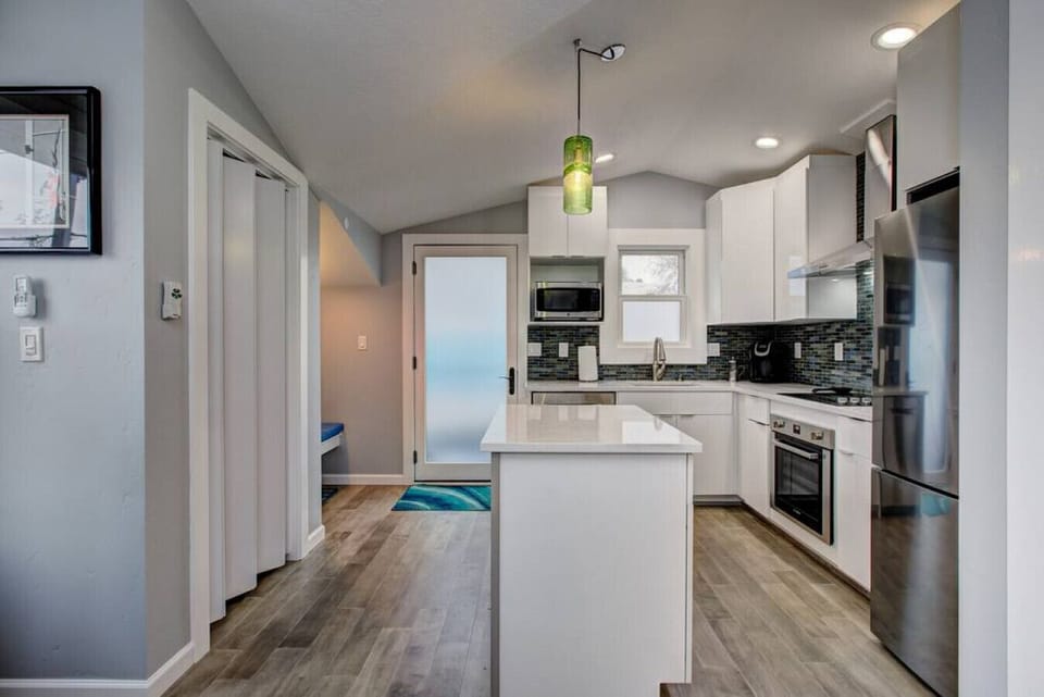 Kitchen island, view of frosted front door for privacy