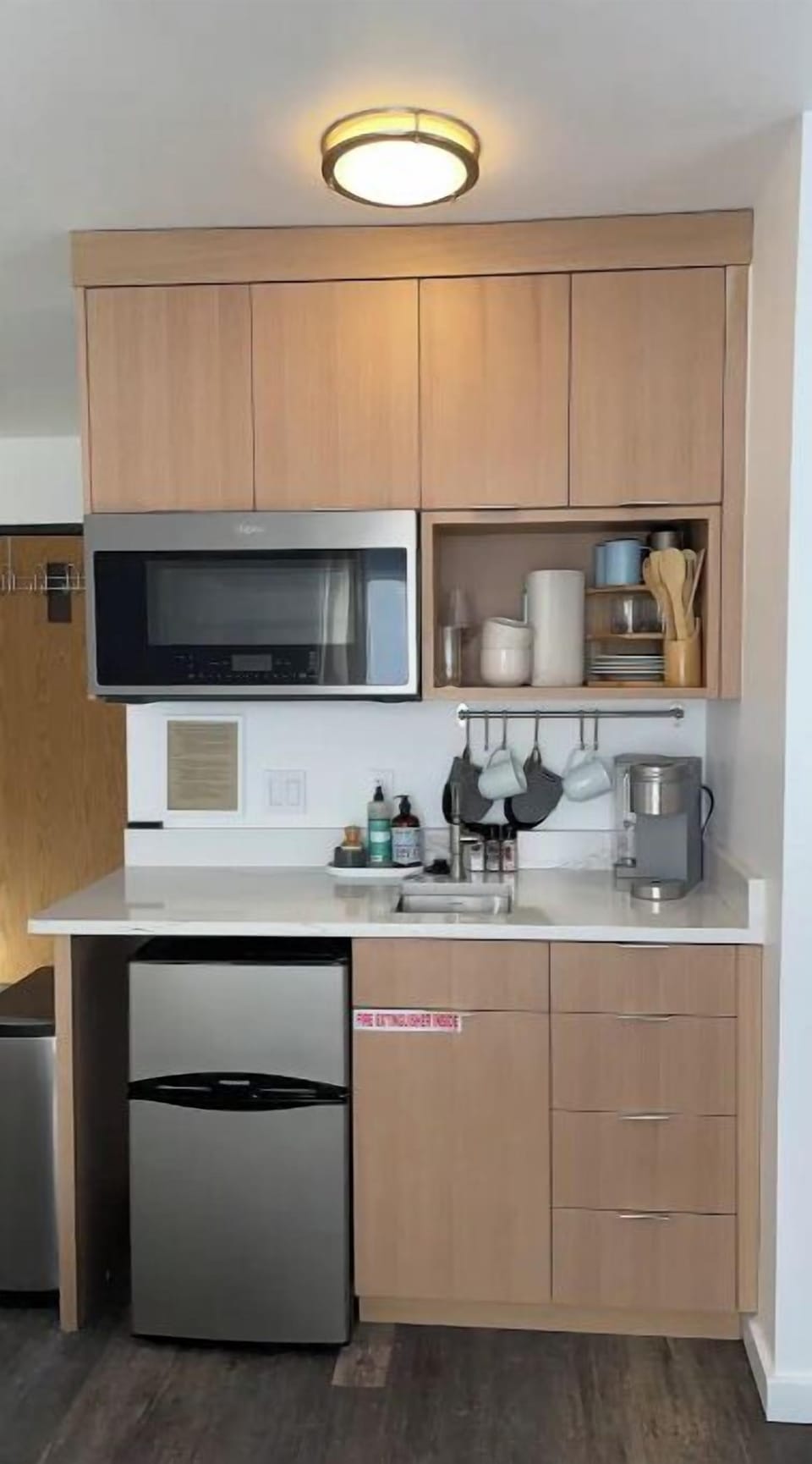 Kitchenette with plug in induction single burner cooktop-located in drawer