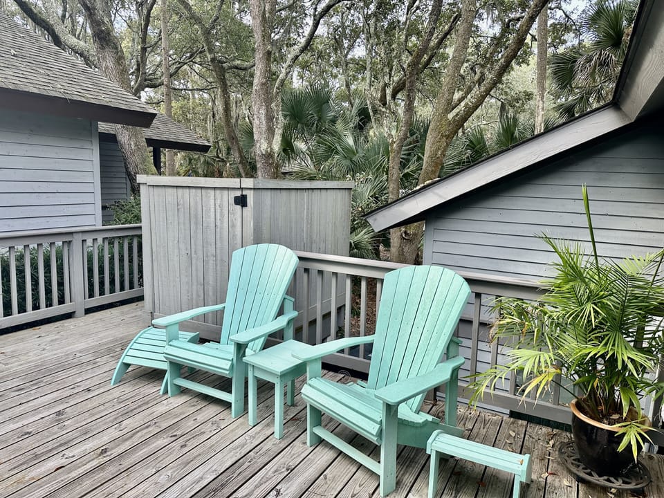 Roomy deck with plenty of room for morning coffee. Charcoal grill available