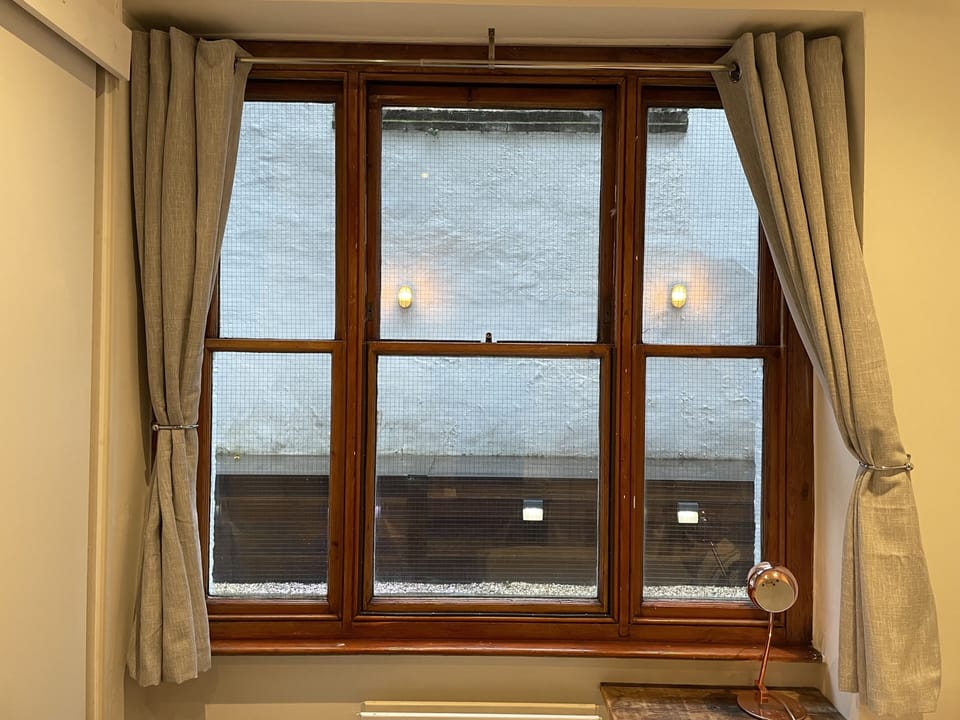 View from the bedroom onto private terrace.