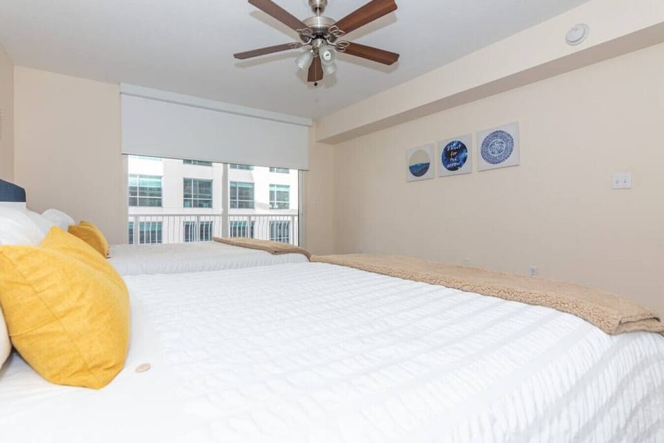 Bedroom featuring cozy Queen sized beds