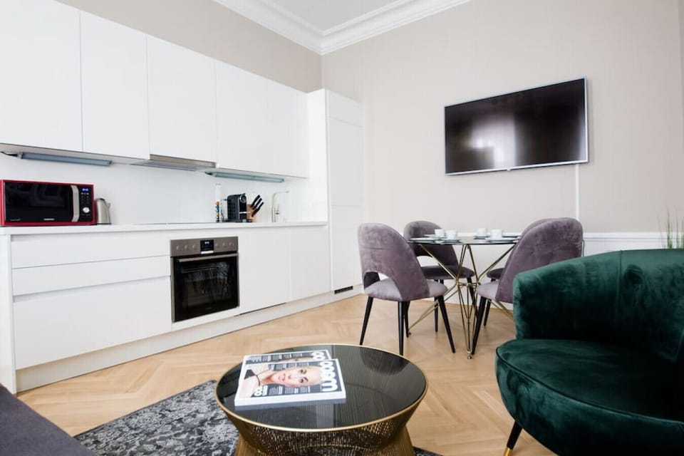 Living room with dining table and kitchen