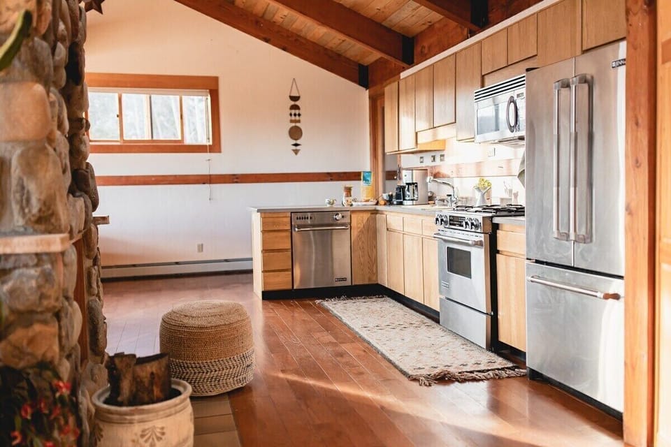 Make any meal you desire in the fully equipped kitchen including nespresso maker, chemex, drip coffee, pots, pans, measuring cups, crockpot, ninja blender, measuring cups, and .. I think you get it