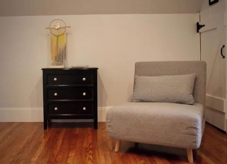 This is a chair that converts into a cot. Good for a small adult/child. 