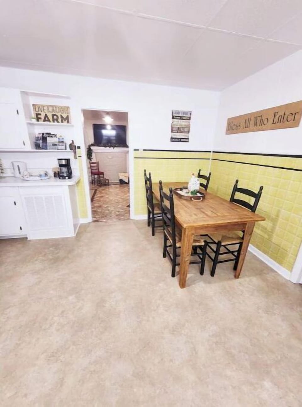 Full kitchen and living room view