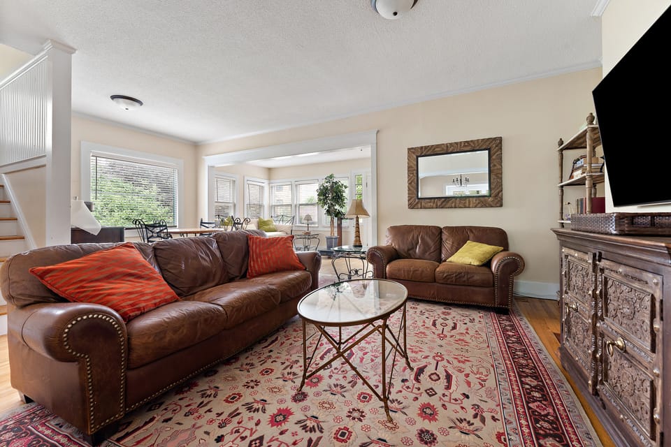 Cozy living room with 65" smart TV.