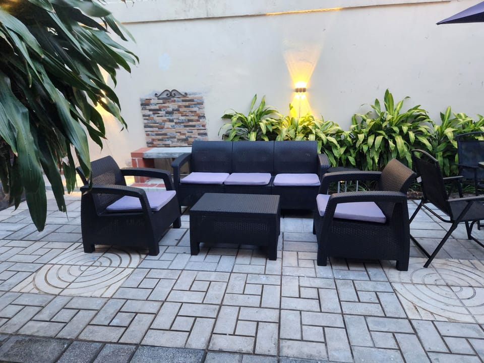 Backyard sitting area.  Outdoor furniture