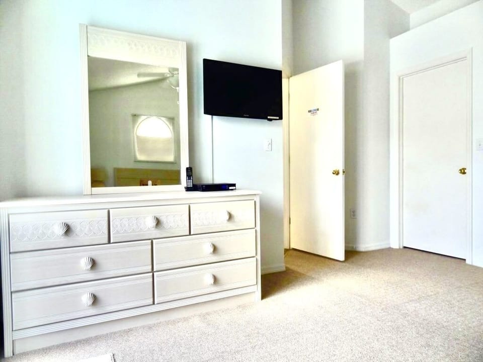 Plenty of storage and TV in bedroom 2