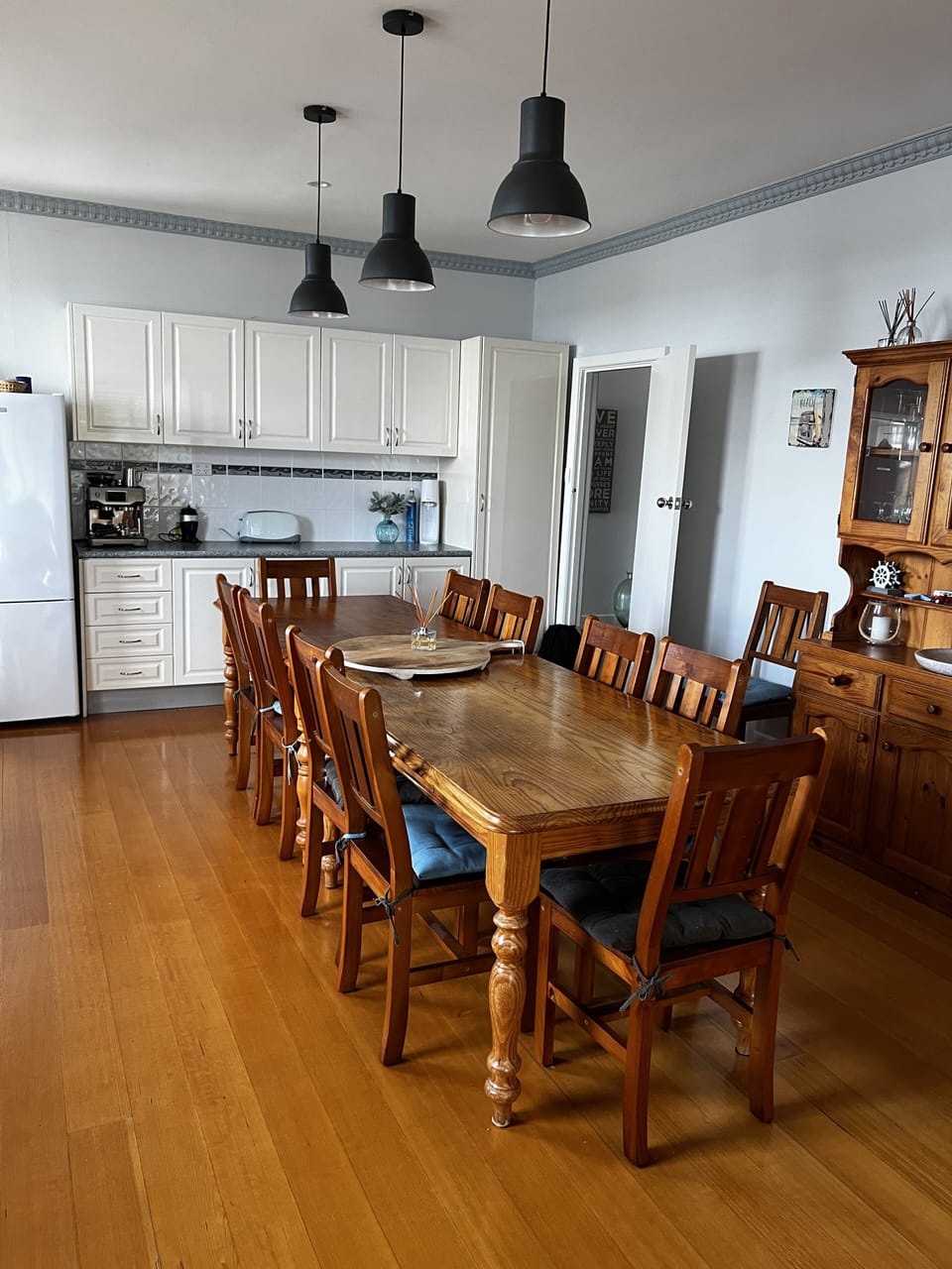 Large dining room enough to seat 12 people at the table 
