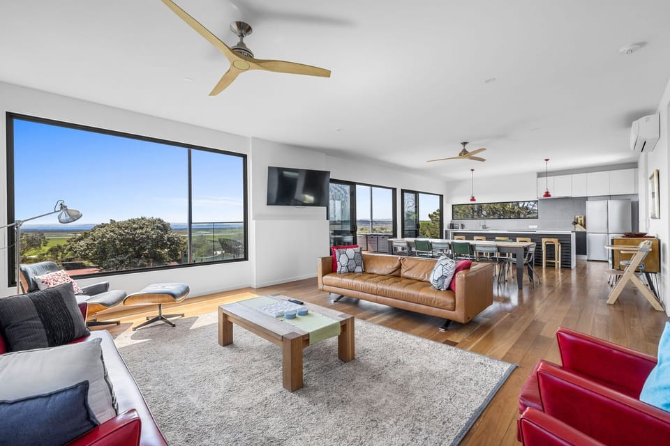 Huge open plan living/dining/kitchen with amazing views.