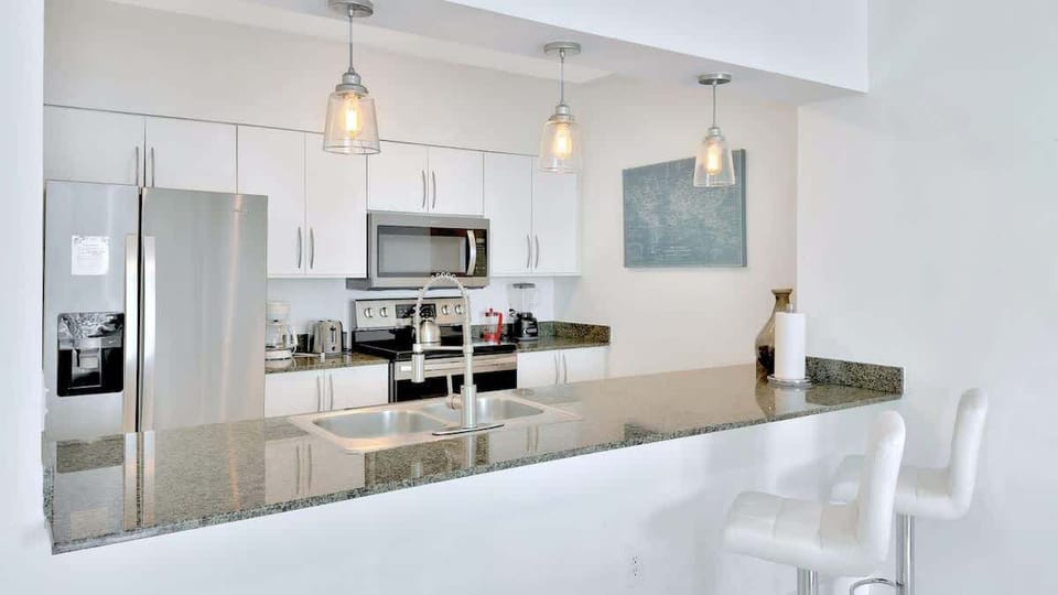 Fully equipped kitchen with modern appliances — everything you need to cook and dine in comfort.          Ask ChatGPT