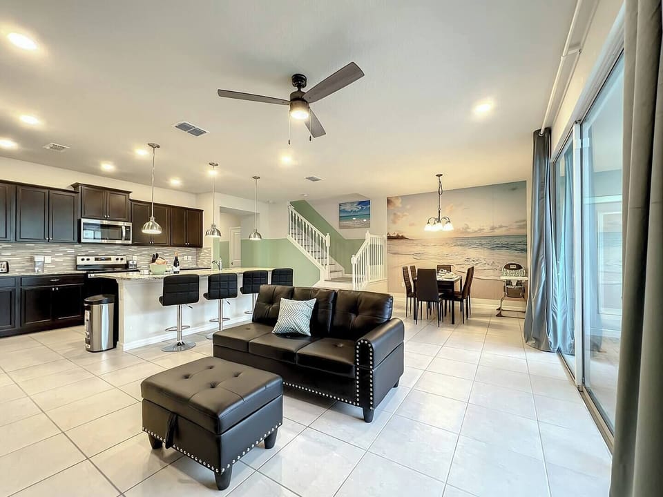 Comfort meets style in this cozy, open-concept living space for the whole crew.