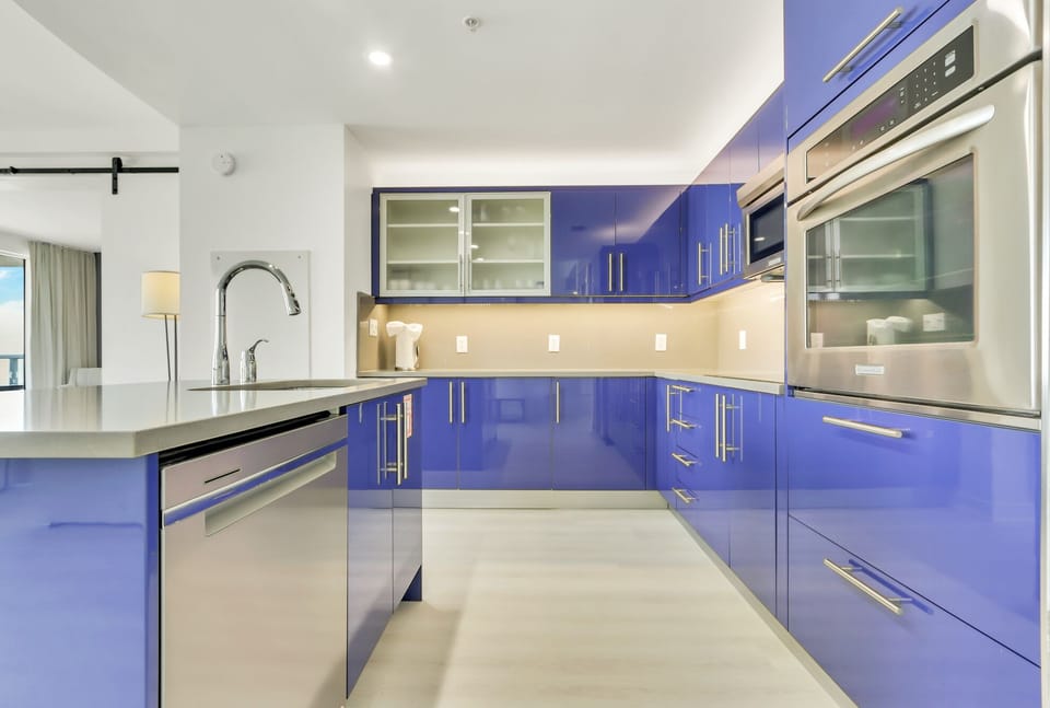 Kitchen cabinetry stocked w/ cooking essentials