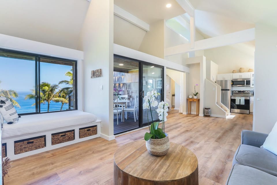 The open floor plan seamlessly connects the living, kitchen, and dining areas for easy entertaining.