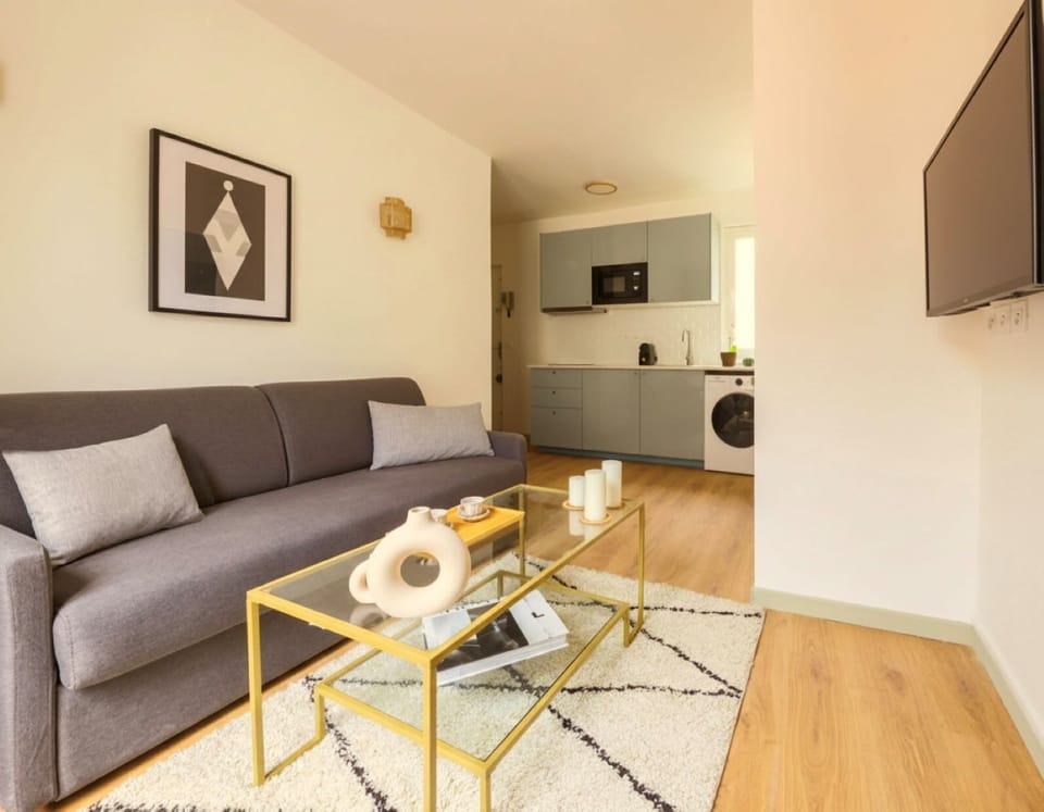 Spacious Parisian Living Room with Premium Linens