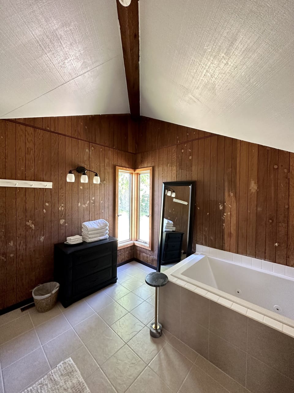 Primary bathroom suite with large, jetted tub. 