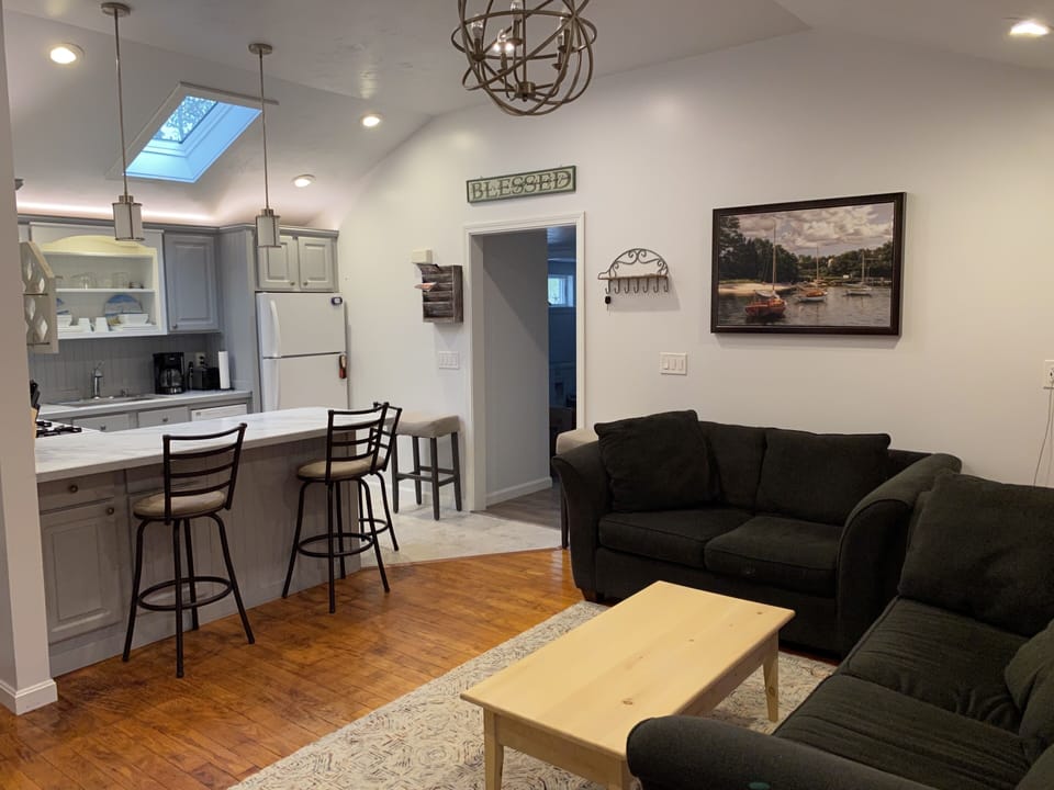 Beautiful kitchen with gas oven dishwasher and microwave.
