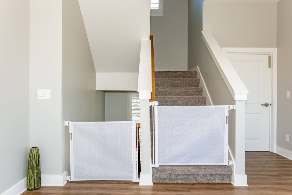 - Baby gates on stairs add family friendly safety throughout stay - Bright clean entryway enhances comfort for guests with children - Safe thoughtful design supports relaxed enjoyable lake vacations