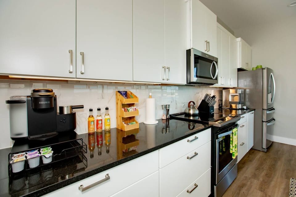 - Fully stocked kitchen with coffee bar spices and essentials - Long counters and bright design perfect for cooking together - Organized layout enhances comfort during your lake getaway