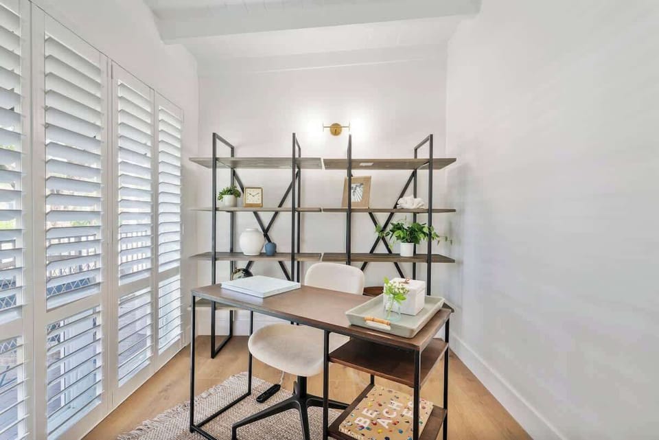 Unit 1 (2 bed/2bath) home office.  Very fast and free WiFi, and a dedicated workspace for remote work.