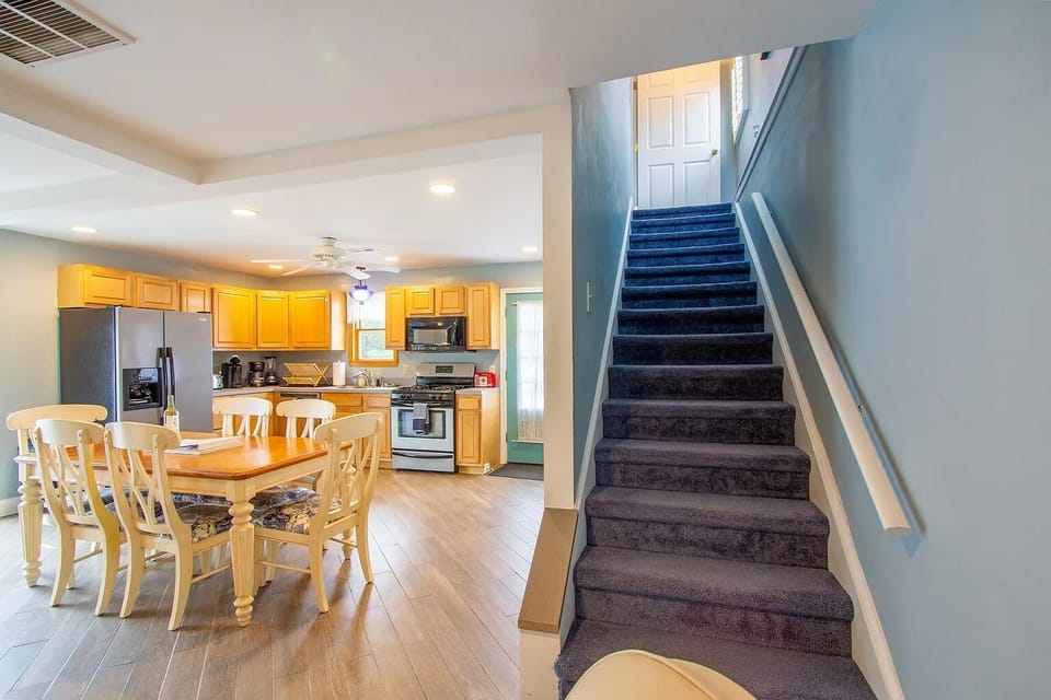 Kitchen and stairs to master bedroom