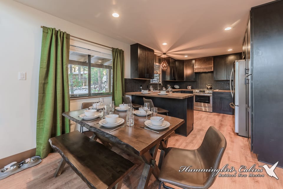 Dining opens into kitchen