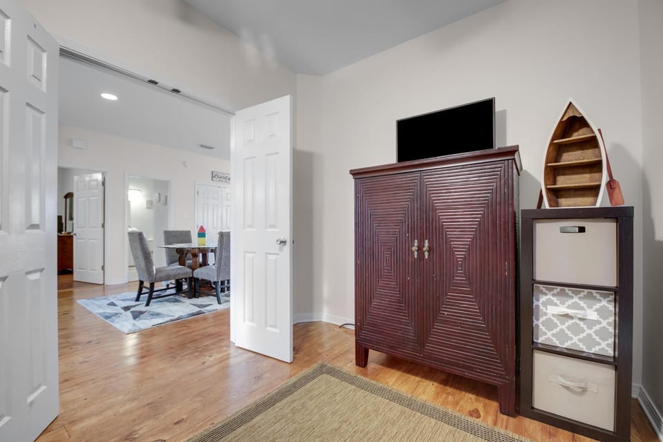 Guest Bedroom 2 - Guest bedroom 2 offers a television and storage space for keeping your personal belongings out of sight.