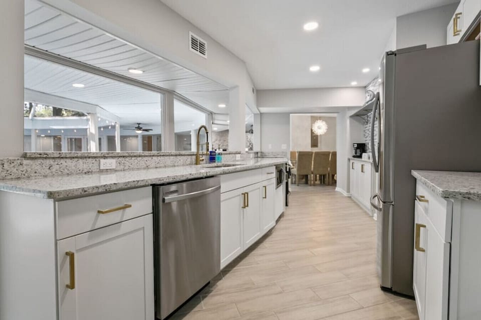 Dishwasher included with dishwasher detergent, soap, and clean sponge for every guest.