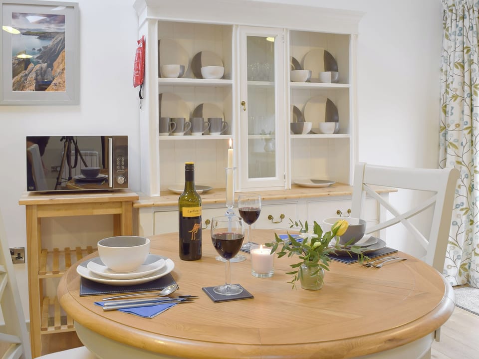 Charming dining area | Honeysuckle Cottage, Valast Hill, near Stackpole