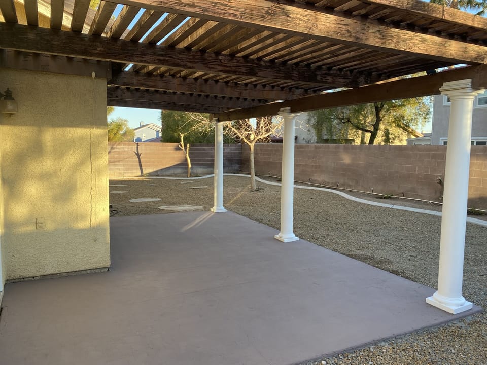 Backyard found off den/tv area.