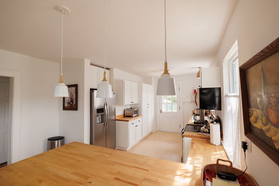 Beautiful kitchen easy to prep and cook in while still being part of happy hour! 
