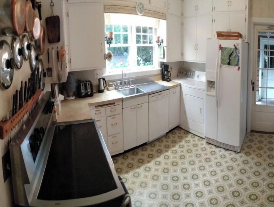 Kitchen with washer & dryer, dishwasher, microwave, oven & stove