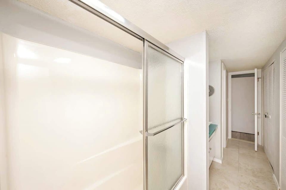 Our Jack & Jill style bathroom offers a shower & tub combo to enjoy baths.