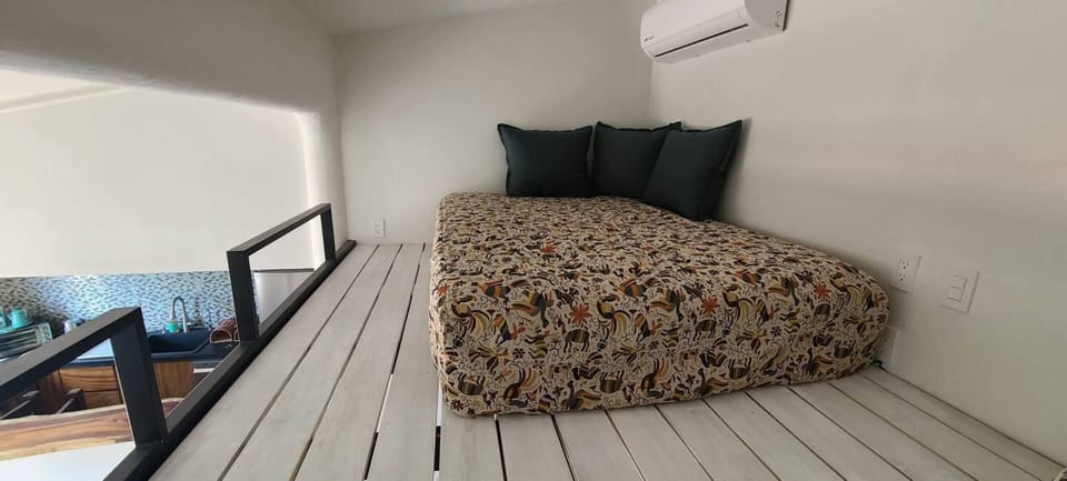 Loft space with double sized mattress for extra sleeping area