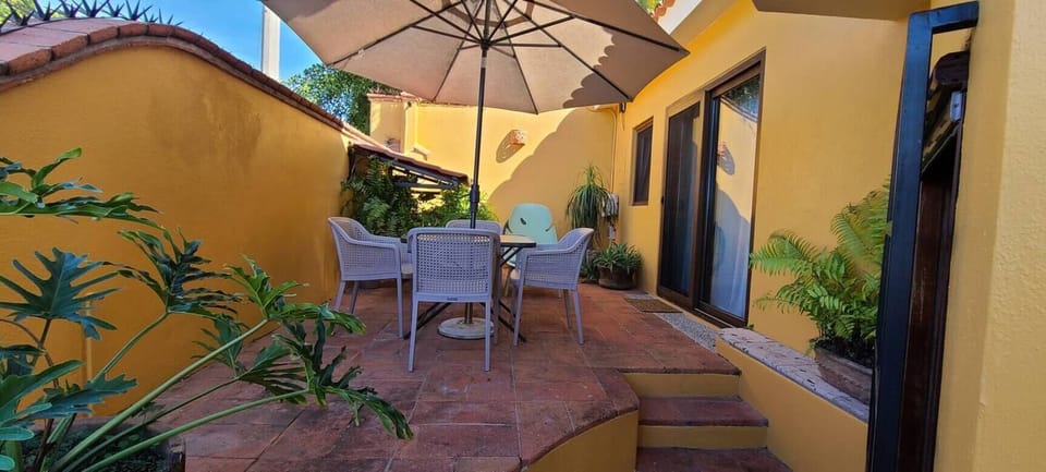 Private dining patio entrance with partial bay views.