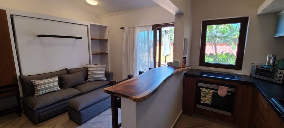 Full kitchen with granite countertops, dishwasher, electric stove & oven