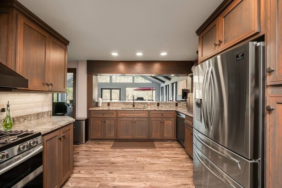 Large kitchen that flows into dining/living space with a large bar - seating for 5