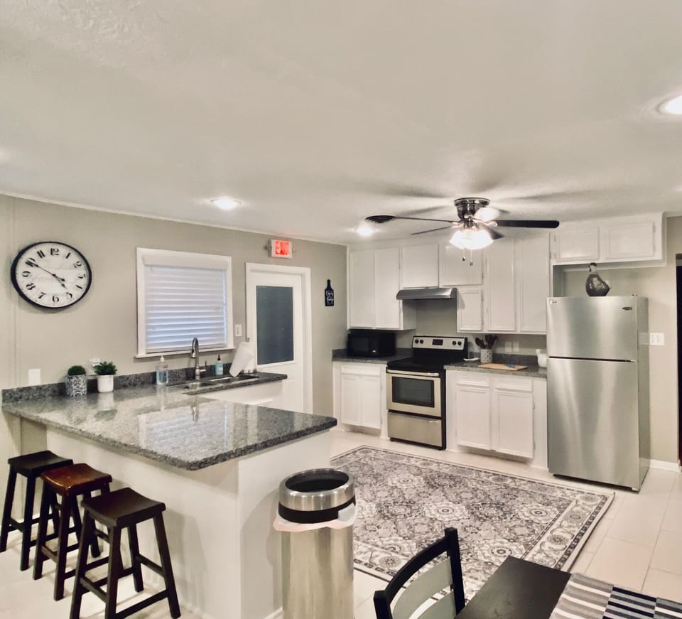 Bright and open kitchen with plenty of counter space. 