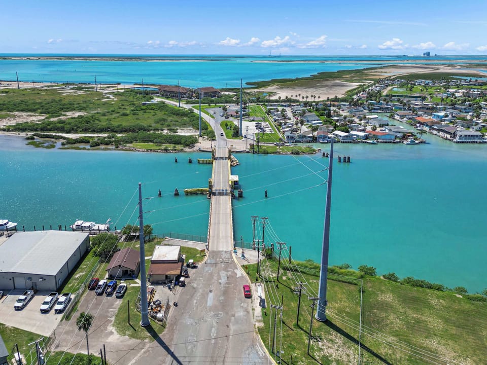 Cross the bridge into the village
