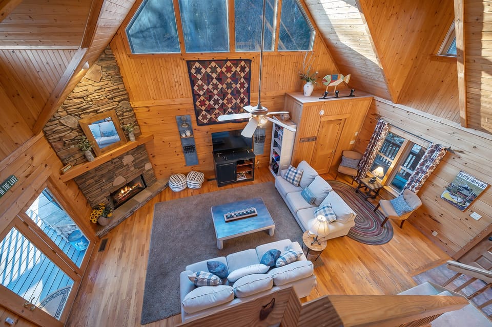 From the loft looking down to the living room of the home