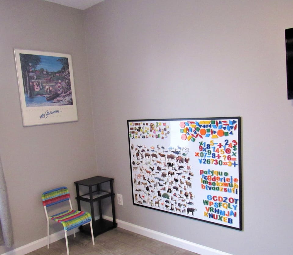 Bedroom 3. Magnetic board with magnets for fun yet quiet play.
