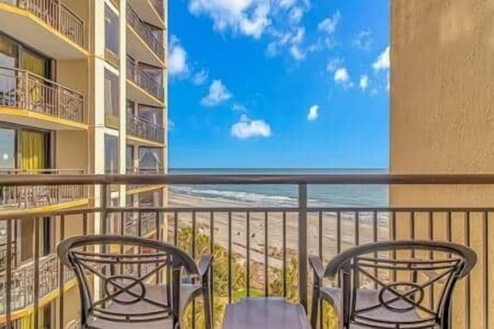 Enjoy your private balcony with beautiful views of the shoreline and resort.